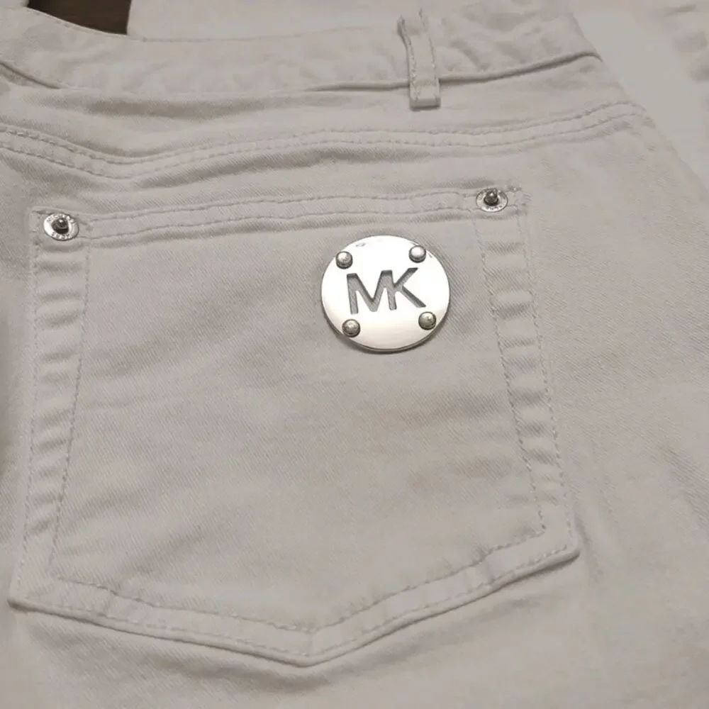 Michael Kors Women Size 10 Mid Rise Flared Leg White Denim Jeans Silver Accents